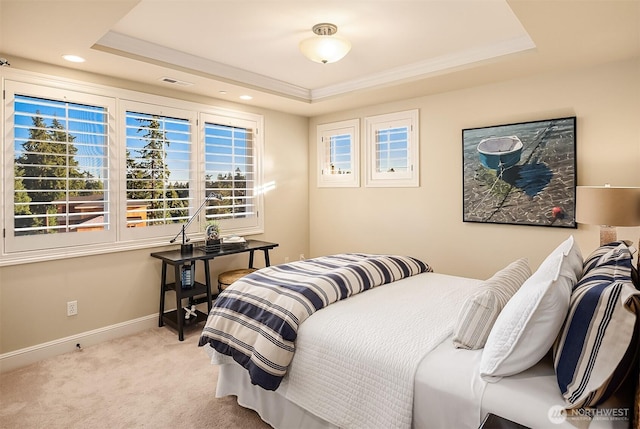 carpeted bedroom with visible vents, recessed lighting, a raised ceiling, and baseboards