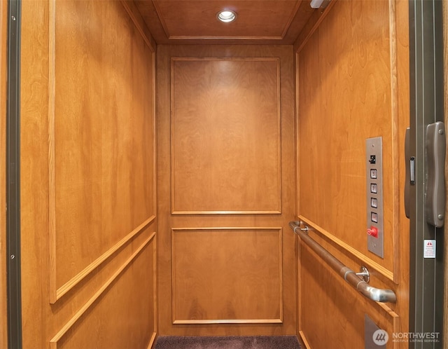 room details with recessed lighting and elevator