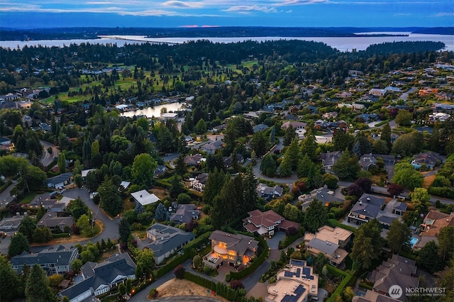 bird's eye view with a water view and a residential view