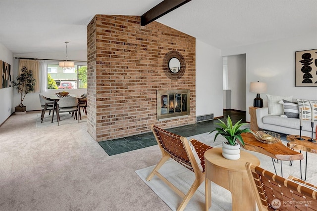 carpeted living room with a fireplace