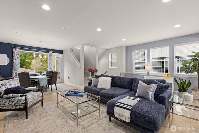 living room featuring recessed lighting and light wood-style floors