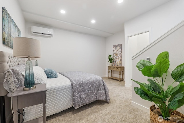 carpeted bedroom with a wall unit AC, baseboards, and recessed lighting