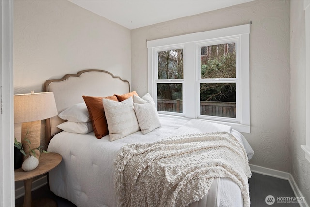 bedroom with baseboards