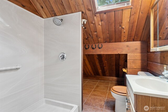 bathroom with toilet, wood walls, wood ceiling, vanity, and a shower