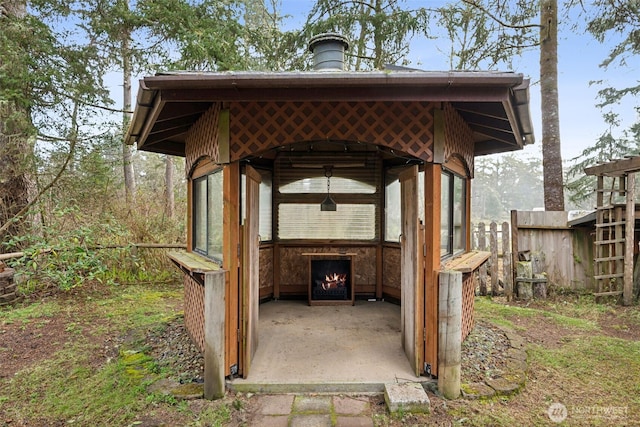 view of patio / terrace featuring fence