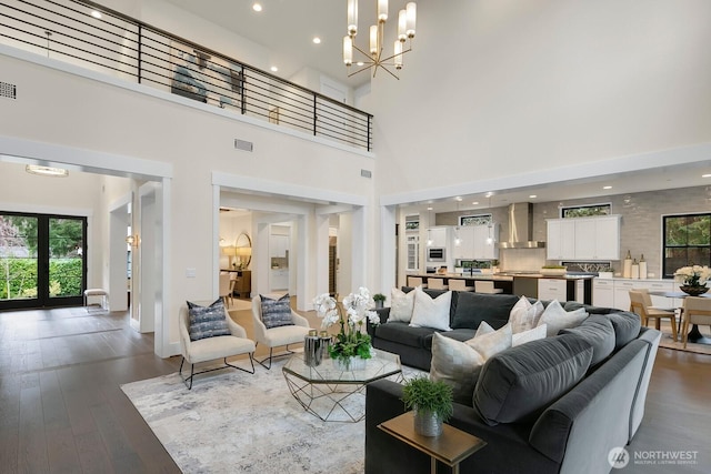 10906 SE 28th St, Bellevue, WA 98004 - living area featuring visible vents, wood finished floors, recessed lighting, and a chandelier