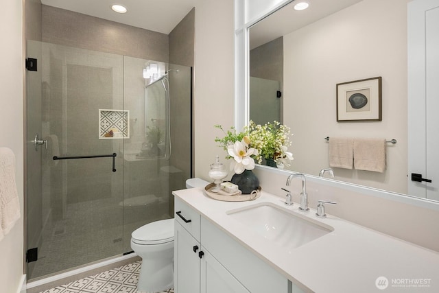 10906 SE 28th St, Bellevue, WA 98004 - bathroom with toilet, vanity, recessed lighting, and a shower stall