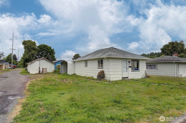 105 Redpath St, Kelso, WA 98675 - rear view of property with a carport and driveway