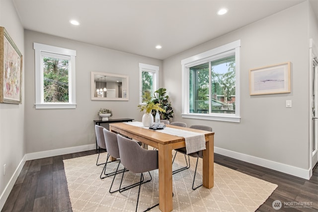 dining area with recessed lighting, plenty of natural light, and baseboards