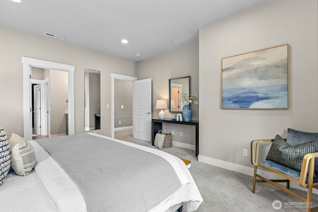 carpeted bedroom with recessed lighting, visible vents, and baseboards