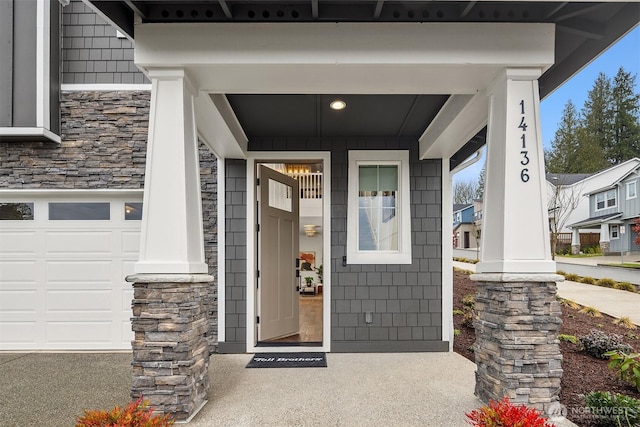 doorway to property with stone siding