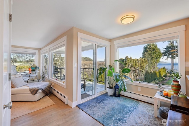 sunroom with a baseboard radiator