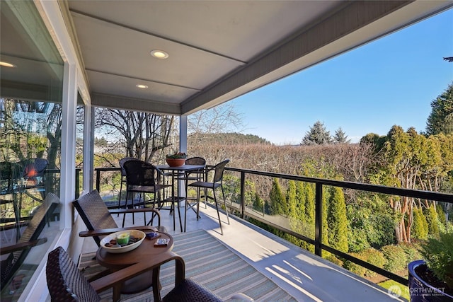 balcony with a wooded view