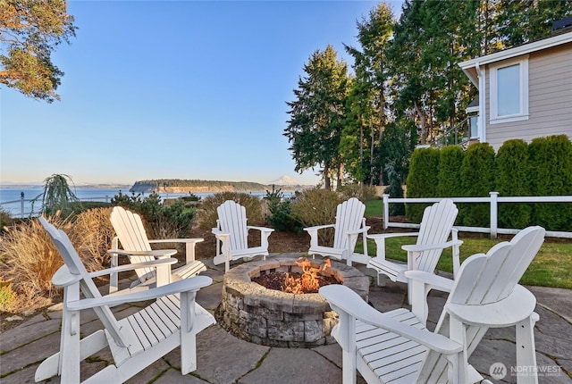 view of patio with a fire pit