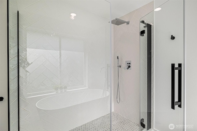 bathroom featuring a stall shower