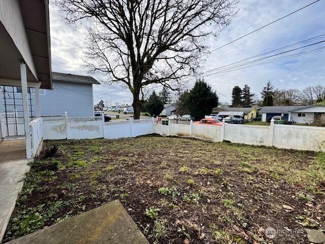 view of yard with fence