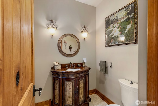 1939 49th St, Port Townsend, WA 98368 - bathroom with vanity, toilet, and baseboards