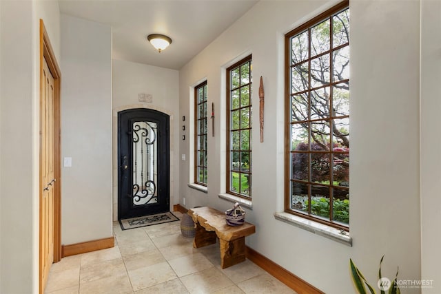 1939 49th St, Port Townsend, WA 98368 - foyer featuring baseboards and light tile patterned floors