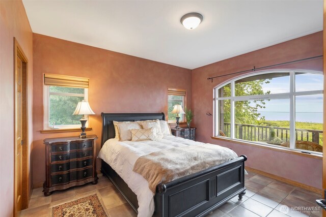 1939 49th St, Port Townsend, WA 98368 - bedroom featuring baseboards and tile patterned floors