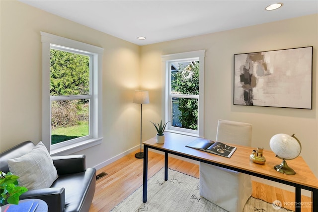 office with recessed lighting, visible vents, baseboards, and wood finished floors