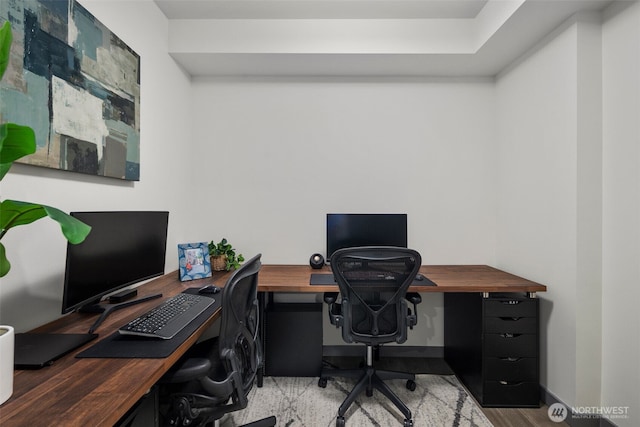 office area featuring baseboards