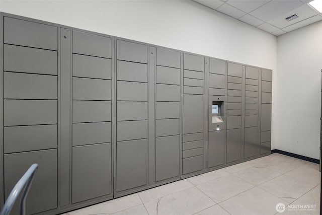 surrounding community featuring a package area and visible vents