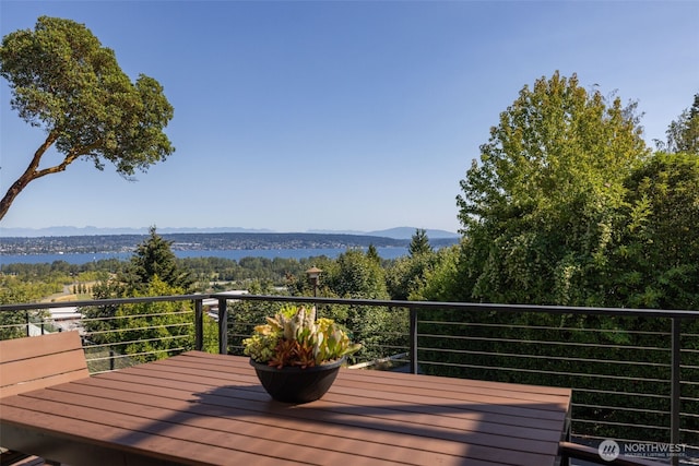 wooden deck featuring a mountain view