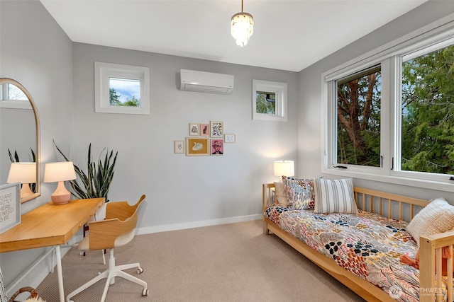 office space featuring a wall mounted AC, baseboards, and carpet floors