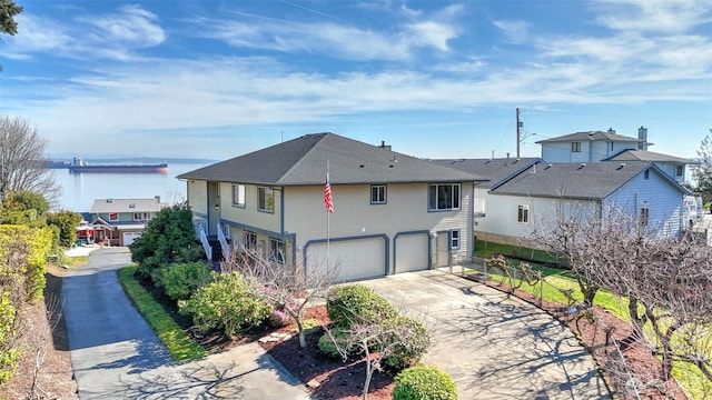 view of front of house with a garage and driveway