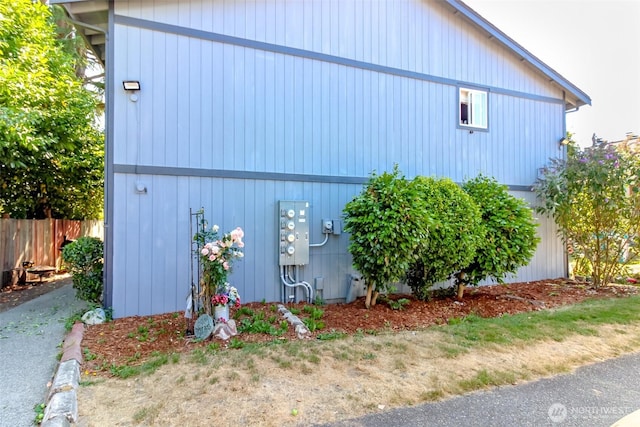 view of side of property with fence