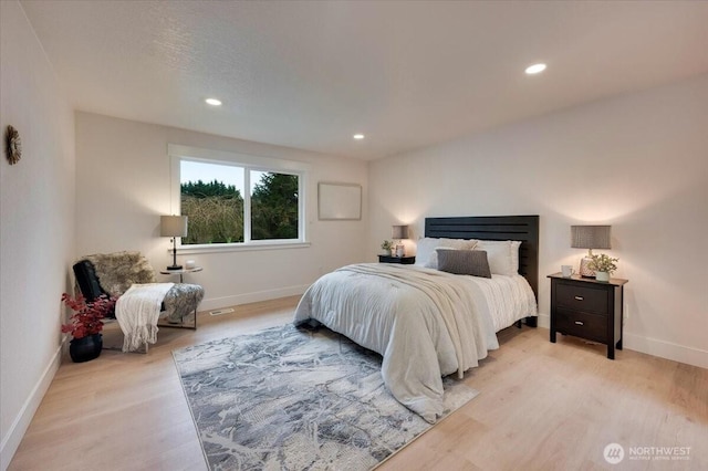 bedroom featuring recessed lighting, baseboards, and light wood finished floors