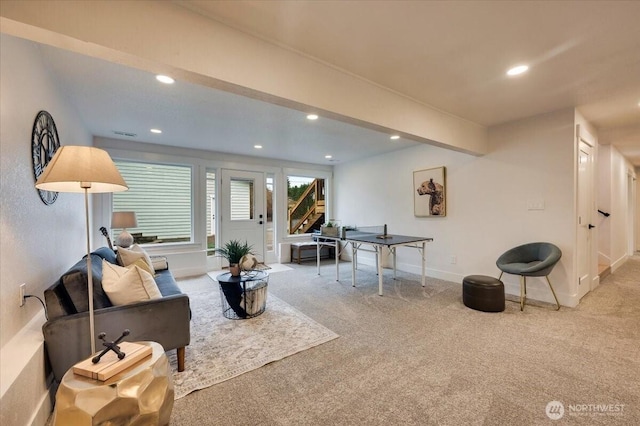 living room featuring baseboards, carpet, beam ceiling, and recessed lighting