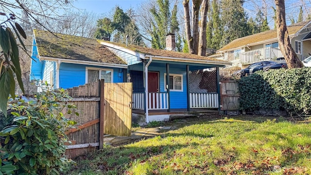 view of outbuilding with covered porch