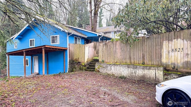 exterior space featuring fence