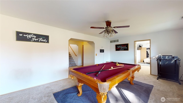 rec room featuring arched walkways, carpet floors, pool table, visible vents, and a ceiling fan