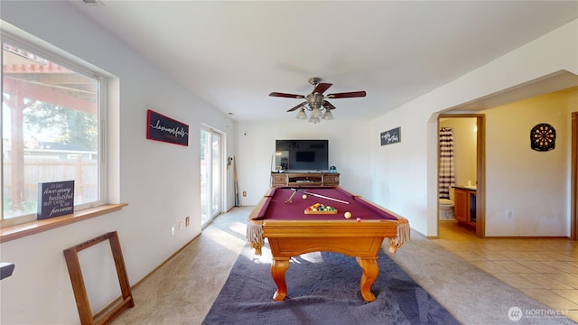 recreation room featuring light tile patterned flooring, billiards, a ceiling fan, and light colored carpet