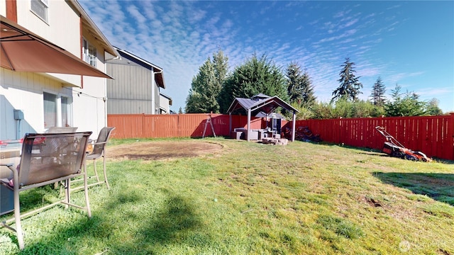 view of yard with a fenced backyard