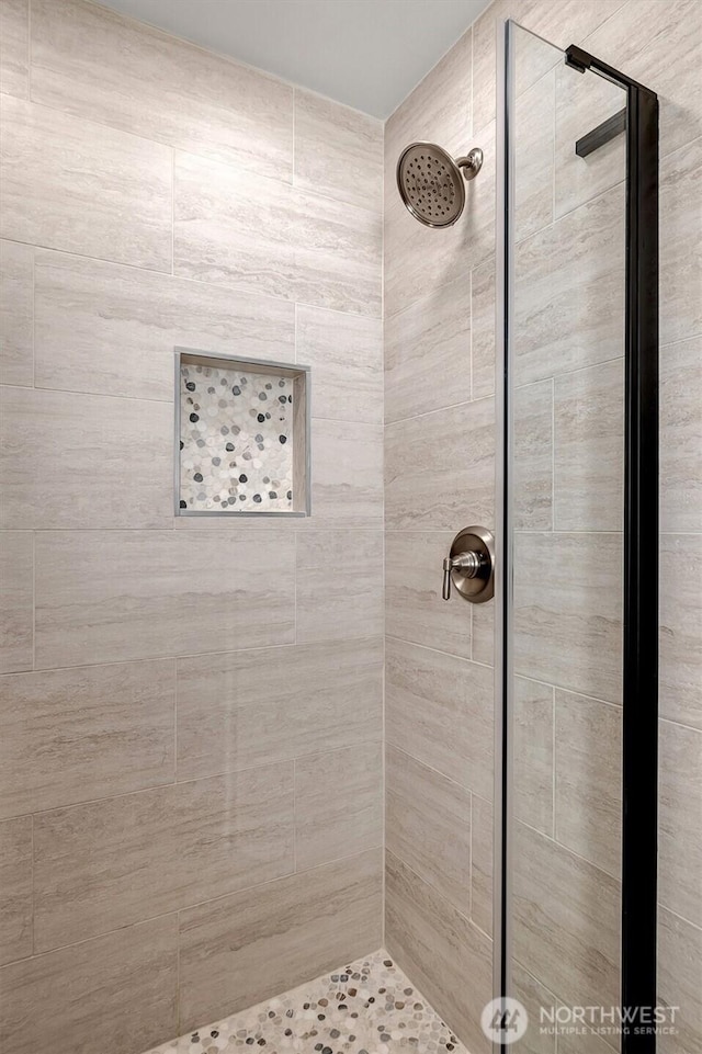 full bathroom with a stall shower