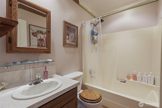 bathroom with toilet, shower / bath combo with shower curtain, and vanity