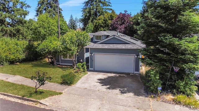 view of front of property with a garage, a front yard, concrete driveway, and a shingled roof