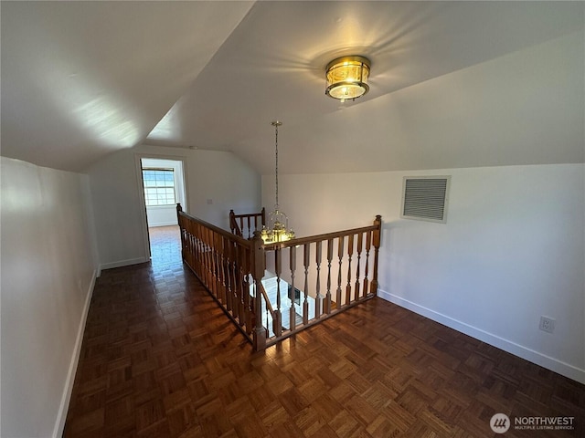 106 Alder St, Pe Ell, WA 98572 - additional living space with vaulted ceiling, visible vents, and baseboards