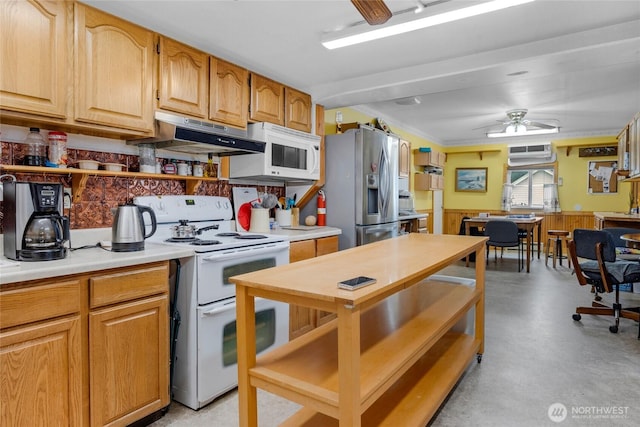 723 E 54th St, Tacoma, WA 98404 - kitchen with concrete flooring, ceiling fan, under cabinet range hood, white appliances, and light countertops