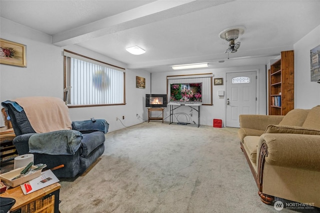 723 E 54th St, Tacoma, WA 98404 - living room featuring carpet flooring and beamed ceiling