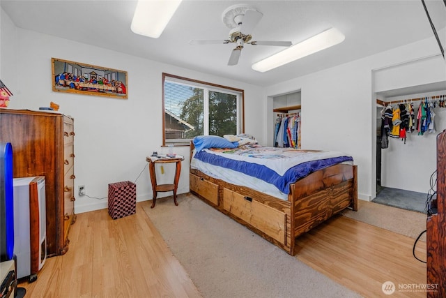 723 E 54th St, Tacoma, WA 98404 - bedroom with ceiling fan and light wood finished floors
