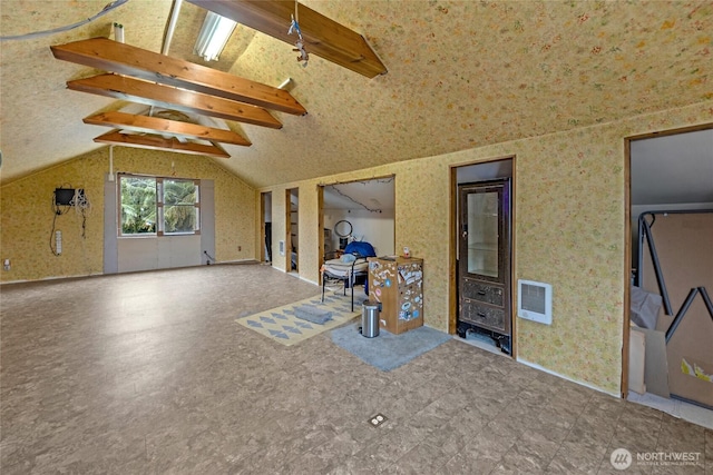 723 E 54th St, Tacoma, WA 98404 - interior space featuring lofted ceiling with beams, wallpapered walls, and tile patterned floors