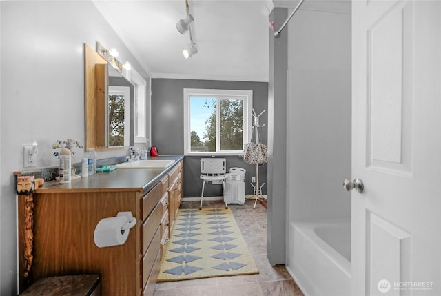 723 E 54th St, Tacoma, WA 98404 - bathroom with rail lighting and vanity