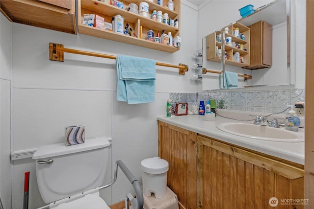723 E 54th St, Tacoma, WA 98404 - half bath featuring backsplash, vanity, and toilet