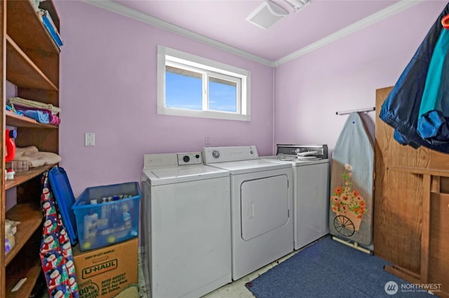 723 E 54th St, Tacoma, WA 98404 - laundry room featuring ornamental molding, laundry area, washer and clothes dryer, and light floors