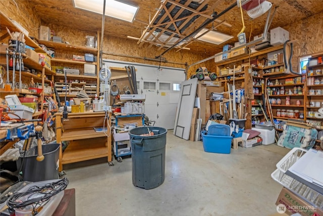 723 E 54th St, Tacoma, WA 98404 - garage featuring a workshop area