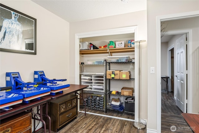 office area featuring a textured ceiling and wood finished floors